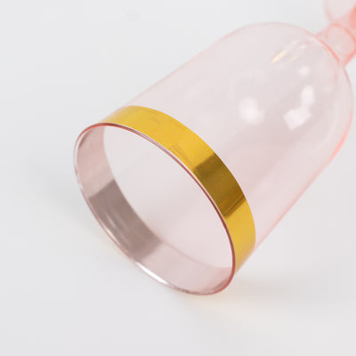 Pink glass with a gold band detail