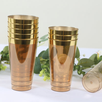 Set of elegant brown plastic cups with gold rims, perfect for parties and events.