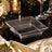 Clear acrylic square serving bowl on elegant black and gold table setting