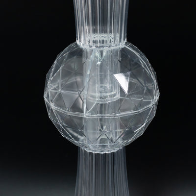 Clear geometric vase with a textured spherical base.