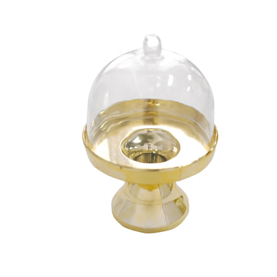 Gold pedestal cake stand with clear dome lid