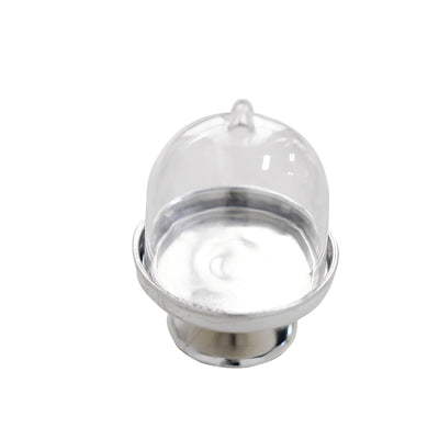 Clear glass cloche with silver base for food presentation