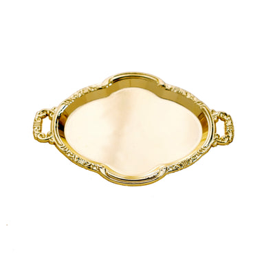 Gold decorative serving tray with ornate handles