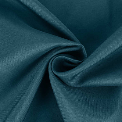 Teal fabric texture showcasing smooth, woven material details.