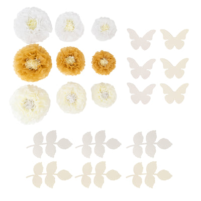 Assorted paper flowers, butterflies, and leaves in white and yellow on a white background.