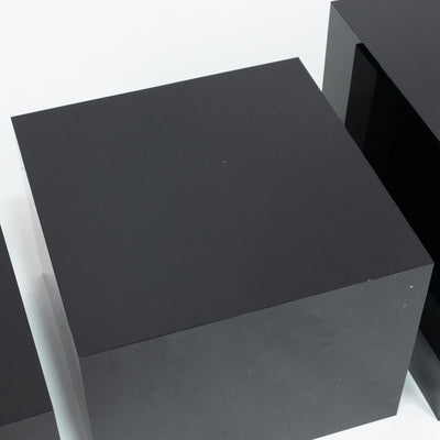 Black matte rectangular pedestal display block on white background