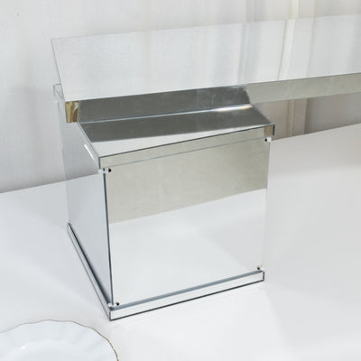 Mirrored storage box with a sleek design and angular shape