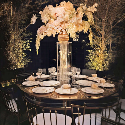 Elegant dining table setup with floral centerpiece and fine dinnerware.