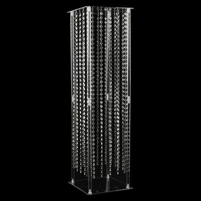 Acrylic jewelry display tower with cascading chains for showcasing accessories.