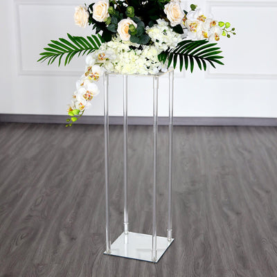 Acrylic flower stand with elegant bouquet arrangement.