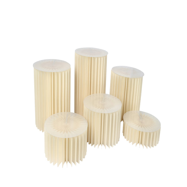 Cream pleated cylindrical pedestal set on white background#whtbkgd