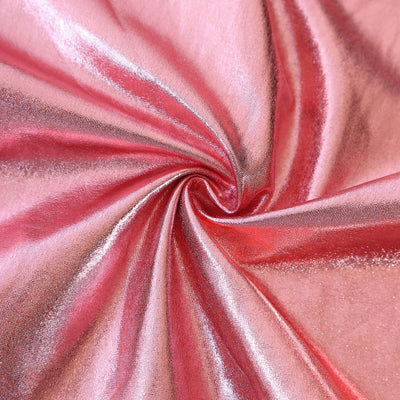 Shiny pink fabric with a smooth, swirling texture.