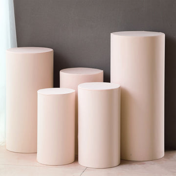 Create Unforgettable Event Experiences with Blush Spandex Pedestal Stand Covers