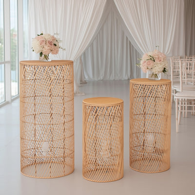 Set of three elegant woven side tables for events and decor.