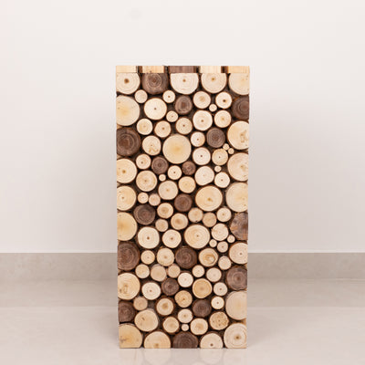 Wooden log decorative panel on a plain backdrop.