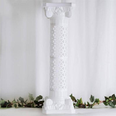 White decorative column with intricate patterns, showcasing elegant design.