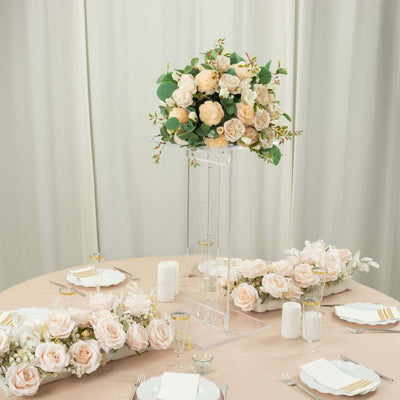 Elegant floral centerpiece arrangement on a banquet table.