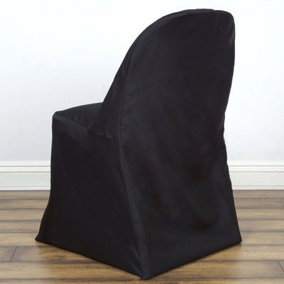 Black fabric chair with a modern design, viewed from the back.