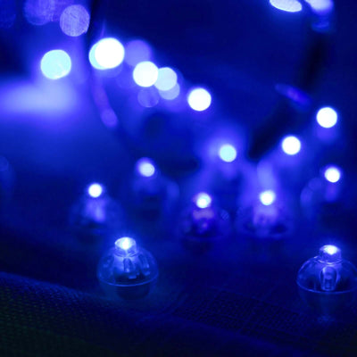 Blue LED lights glowing softly against a dark background.