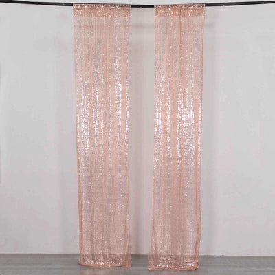 Sparkling pink sequin curtains hung on a rod.