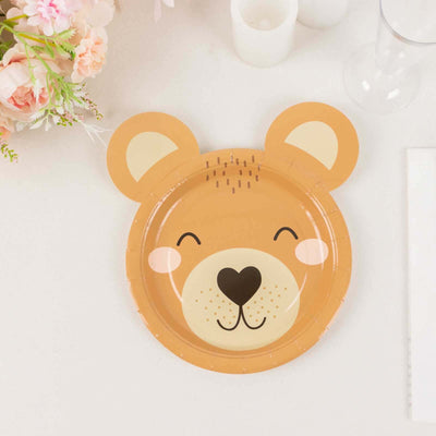 Bear-shaped paper plate with a smiling face on a light background.