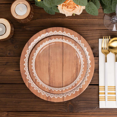 Wooden plates with white lace design on a rustic table setting.
