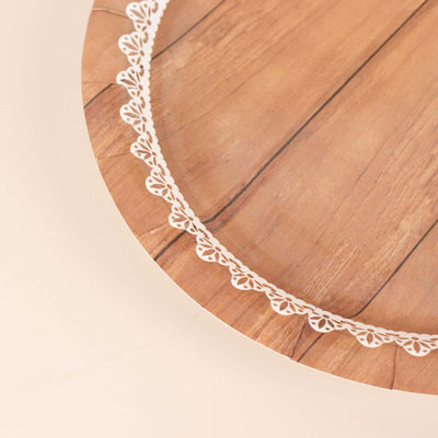 Wooden serving plate with lace trim design
