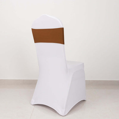 White chair cover with brown sash, studio shot.