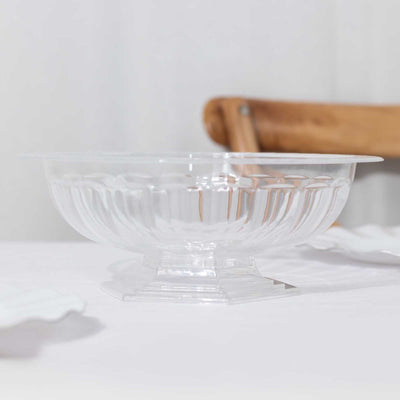 Clear plastic serving bowl with decorative ridges.
