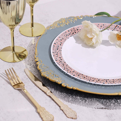 Elegant dinnerware set with gold accents and floral decoration.