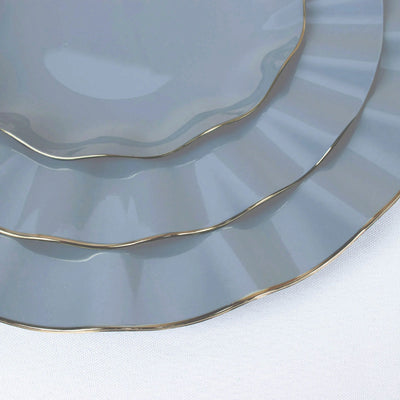 Elegant gray plates with gold trim in three sizes