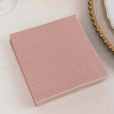 Pink napkin on a neutral table setting