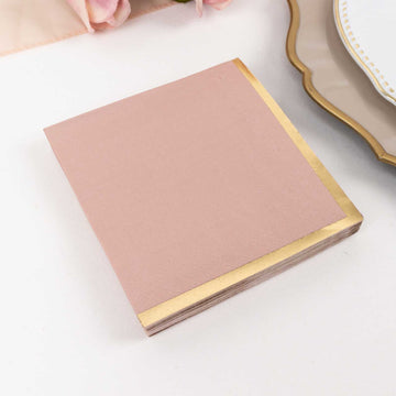 50 Pack Dusty Rose Paper Beverage Napkins with Gold Foil Edge, Soft 2 Ply Disposable Cocktail Napkins - 5"x5"