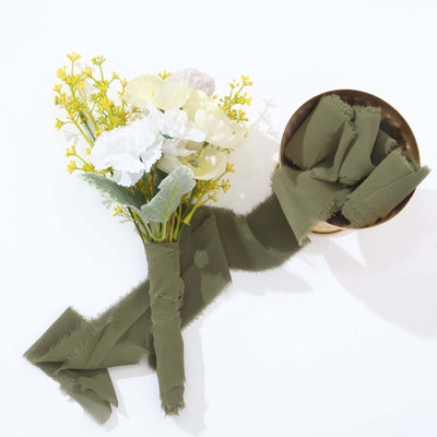 Olive green fabric ribbon with flowers on a white backdrop