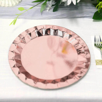 Rose gold disposable plate on a table setting.