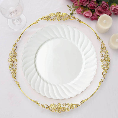 Elegant white plate with gold ornate rim on a white background