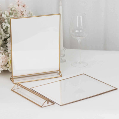 Elegant gold-framed clear glass display stands for decor and signage