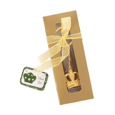 Gold crown keychain gift in elegant packaging with a thank you tag.