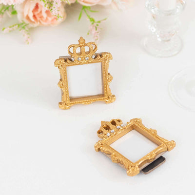 Gold crown picture frames on a white background