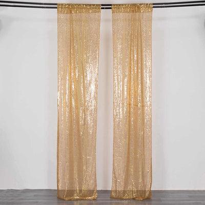 Gold sequin curtains draping elegantly on a rod.