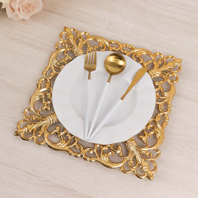 Elegant gold decorative plate with white dinnerware and flatware.