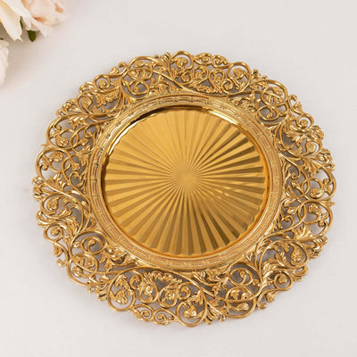 Ornate gold decorative plate with intricate floral design and fluted center.