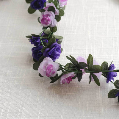 Purple and pink artificial flower garland decoration.