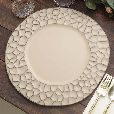 Decorative stone-patterned charger plate on a wooden table.