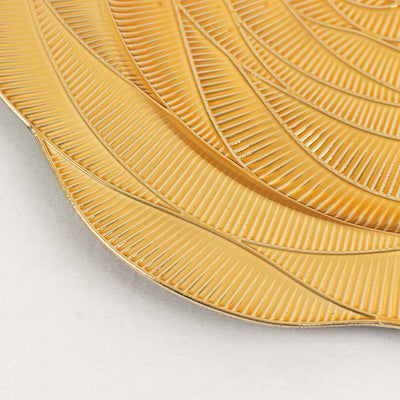 Textured yellow leaf-shaped plate with a glossy finish.
