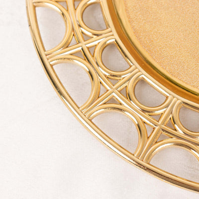 Gold decorative plate with intricate cutout design.