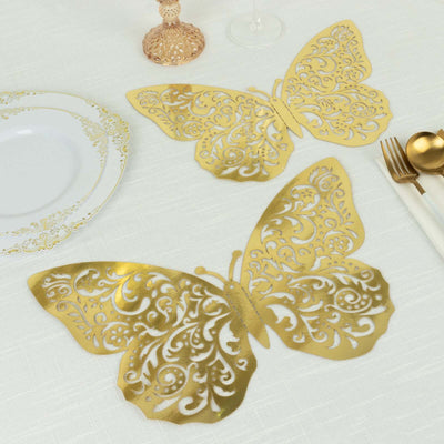 Gold butterfly table decorations for elegant dining.