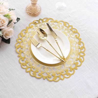 Gold decorative plate with cutlery on a textured table setting.