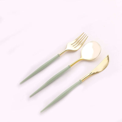 Gold and green cutlery set including fork, spoon, and knife.