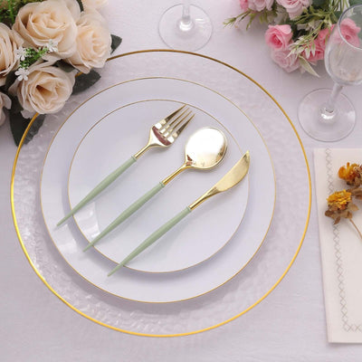 Elegant table setting with gold-accented plates and mint green cutlery.